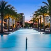 Resort-style swimming pool with lounge seating