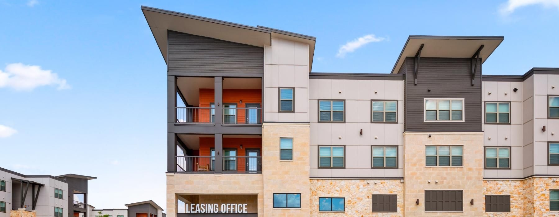 a building with a parking lot